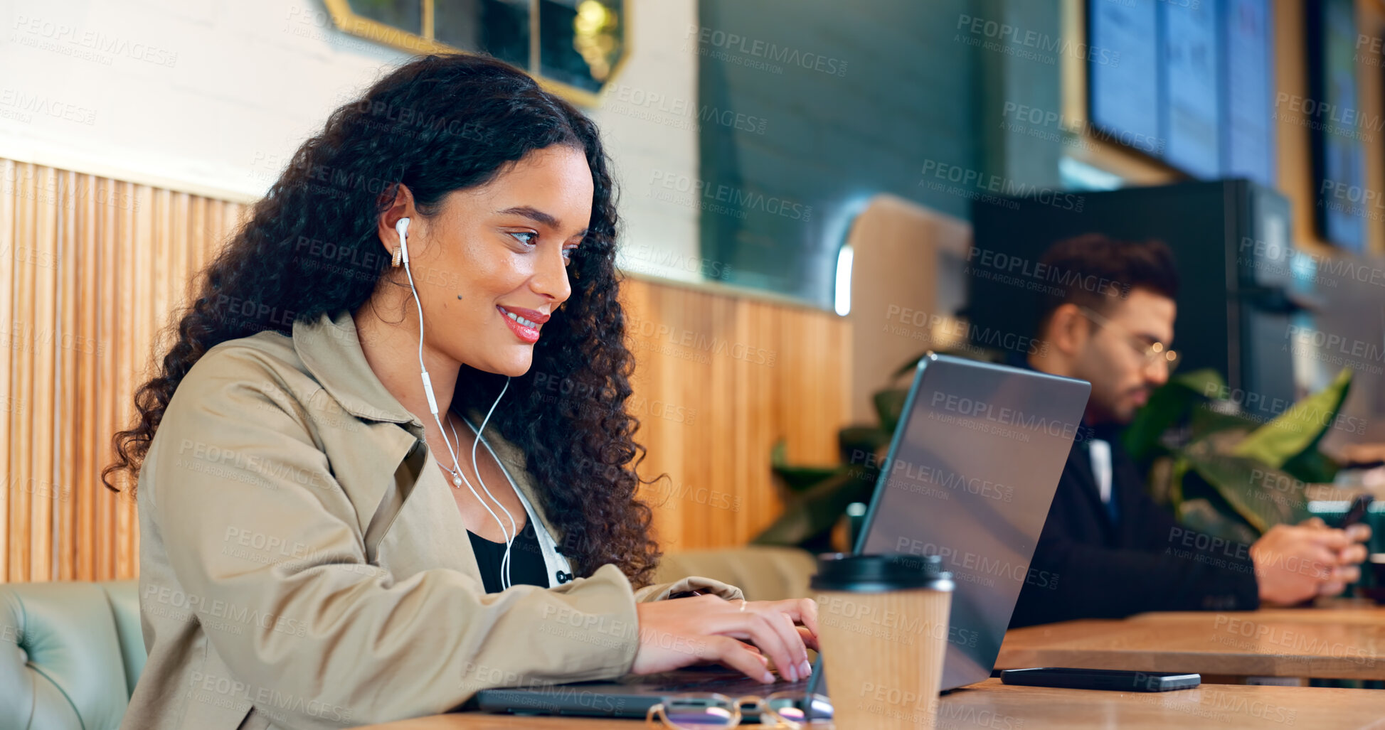 Buy stock photo Woman, typing and laptop in coffee shop for remote work, research or networking for business with smile. Face, person and happiness with music in restaurant for copywriting, internet and freelancer