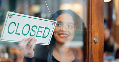 Happy woman, small business or closed sign on window in coffee shop or restaurant for end of service. Closing time, smile or manager with board, poster or message in retail store or cafe for notice