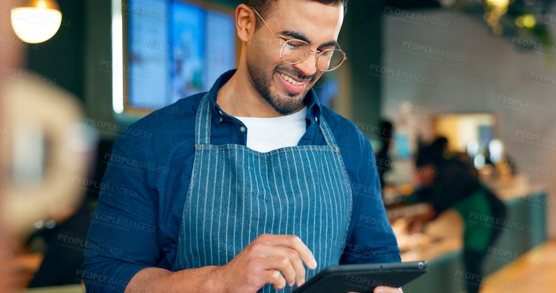 Buy stock photo Cafe, happy man and barista on tablet of restaurant sales, online management or customer service reviews. Entrepreneur, waiter or small business owner reading digital technology for coffee shop data