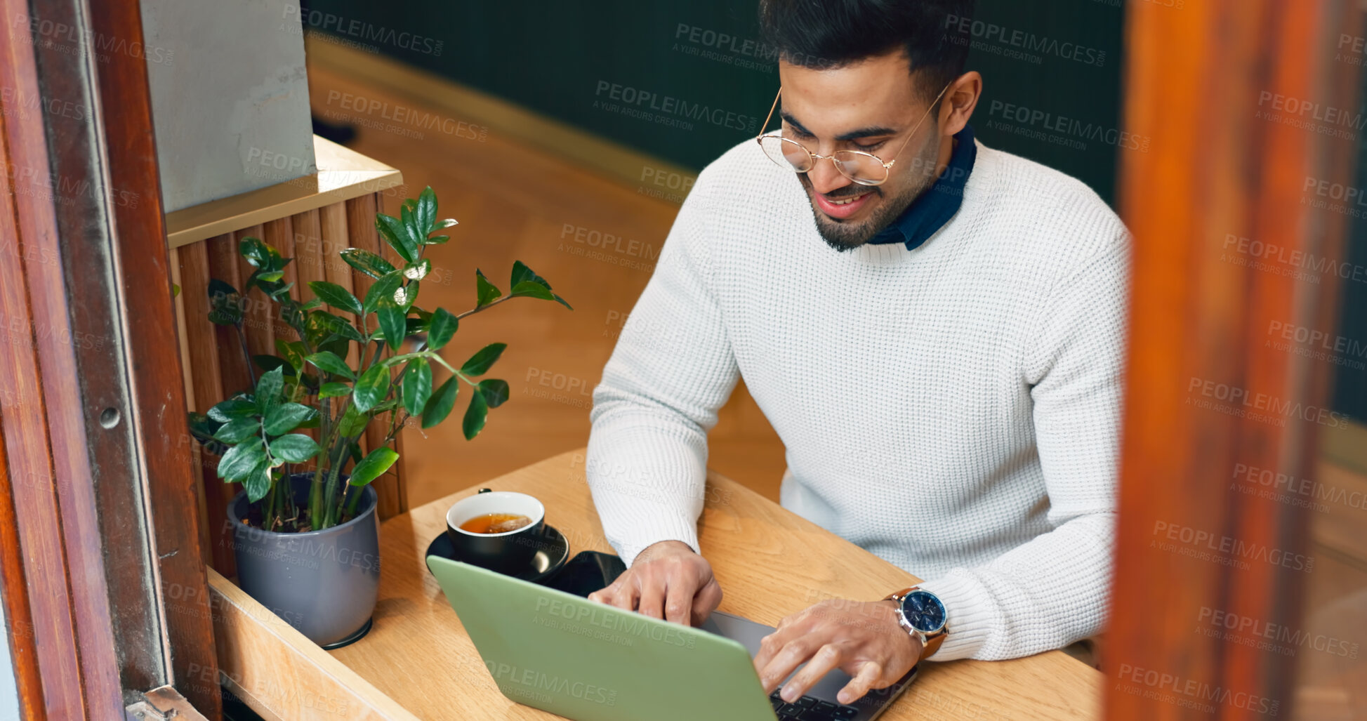 Buy stock photo Cafe, thinking and man with a laptop, typing and connection with inspiration, copywriting and planning. Person, freelancer or entrepreneur with a pc, coffee shop or project with creativity or startup