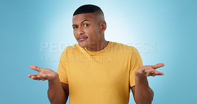 Buy stock photo Confused, shrug and portrait of man in studio with why hands on blue background space. Doubt, face and model with dont know emoji for choice, decision or palm scale, questions or asking body language