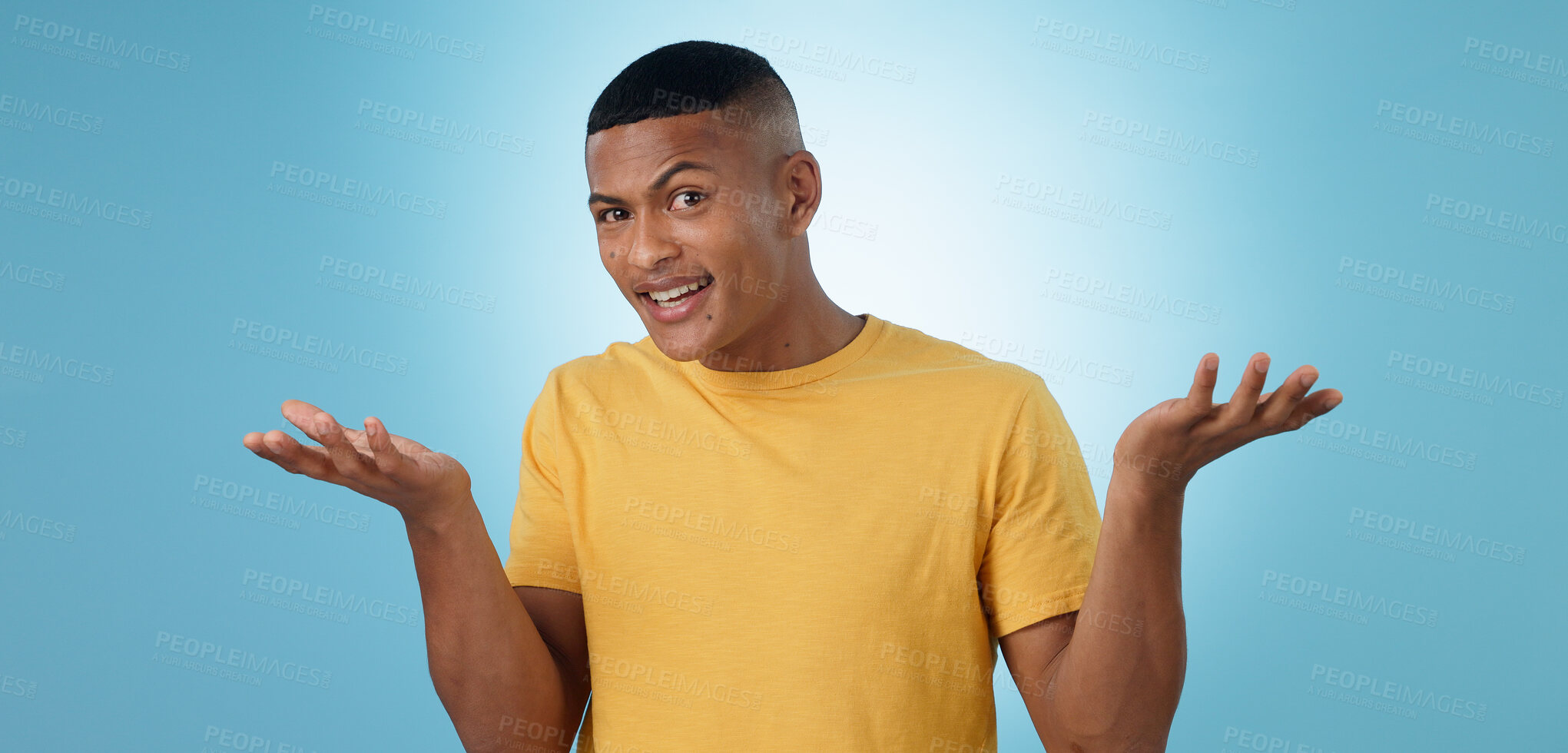 Buy stock photo Confused, portrait and man in studio shrug with emoji hands or asking body language on blue background. Why, face and male model with palm scale questions, doubt or comparison, balance or dont know