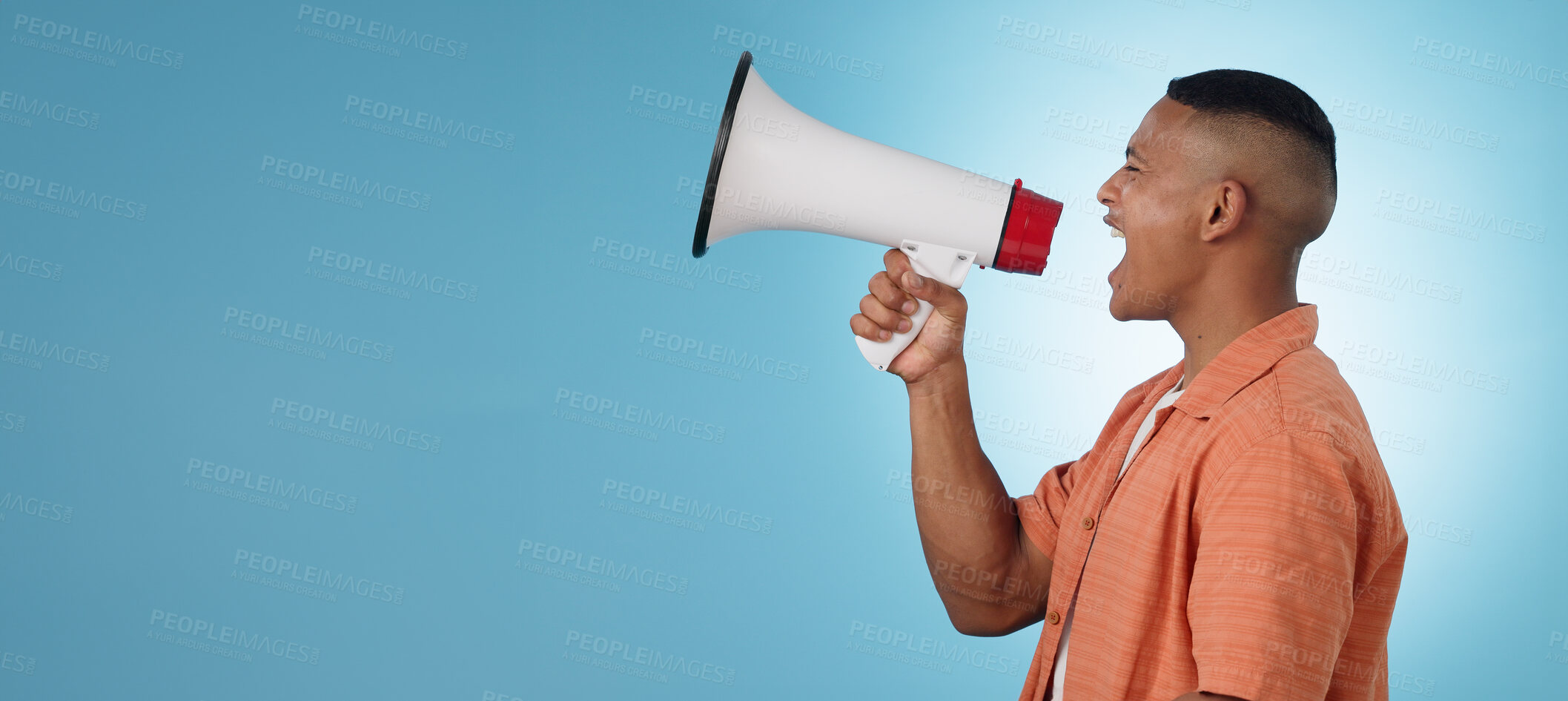 Buy stock photo Man, megaphone and voice for protest, angry speech in politics, justice and vote for change on blue background. Profile of young leader with noise, call to action or shout on  mockup or studio banner