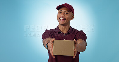 Buy stock photo Portrait, happy man and courier with delivery in studio for mock up on blue background in Cape Town. Male model, smile and excited for logistics, shipping or distribution of package, parcel or order