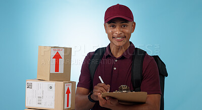 Buy stock photo Delivery man, boxes and checklist for courier service, distribution and writing invoice on a blue background. Portrait of logistics worker with package, receipt and clipboard or paperwork in studio