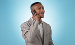 Business man, phone call and laugh in studio for consulting, communication and chat on blue background. Happy worker, mobile networking and contact for feedback, conversation and funny discussion 