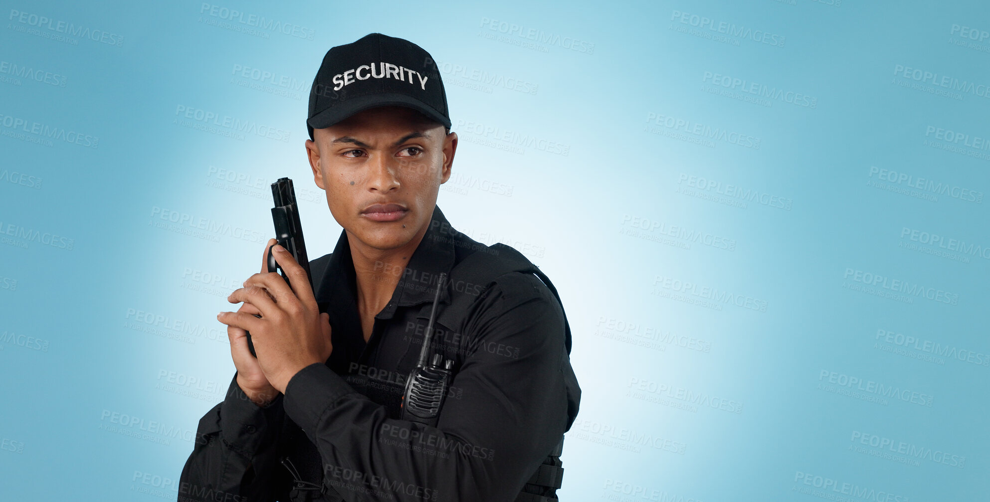 Buy stock photo Man, security guard and holding gun for shooting, protection and precaution for job, serious or confident. Target, killing or weapon for criminal, safety or studio background for pistol, crime or law