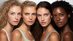 Group of young mixed race models in studio shot. Beauty, fashion concept.