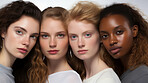 Group of young mixed race models in studio shot. Beauty, fashion concept.