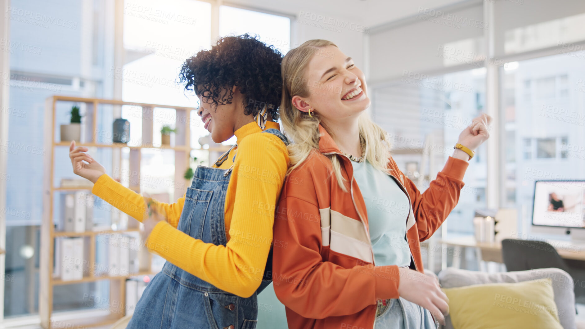 Buy stock photo Women, lesbian couple and dance in home, happy and air guitar in living room. Gay girls, party and moving to music in celebration, bonding or smile for freedom, energy or excited in interracial house