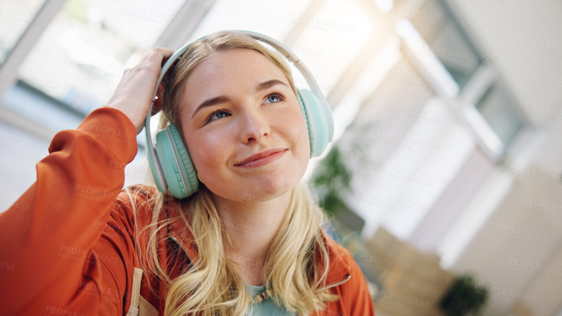 Buy stock photo Music, relax and streaming with woman on sofa for podcast, happy and energy. Freedom, media and online radio with person listening to headphones in living room at home for technology, sound and audio