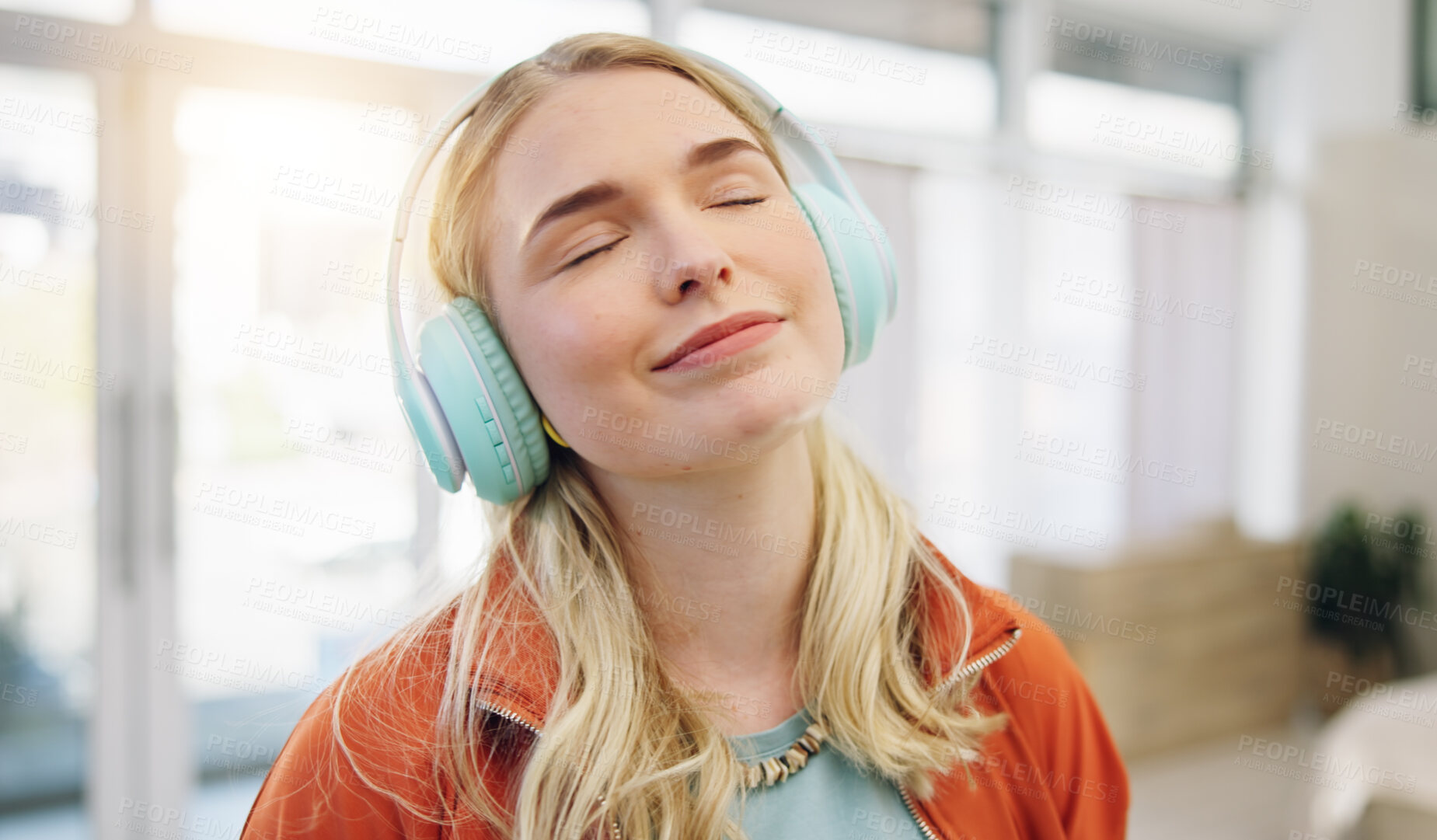 Buy stock photo Music, smile and relax with woman on sofa for streaming, happy and energy. Freedom, media and online radio with person listening to headphones in living room at home for technology, sound and audio