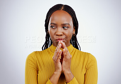 Buy stock photo Thinking, black woman and scheme hands in studio for evil, planning or revenge on grey background. Plotting, villain and African female model with steeple emoji for brainstorming, spy or mischief