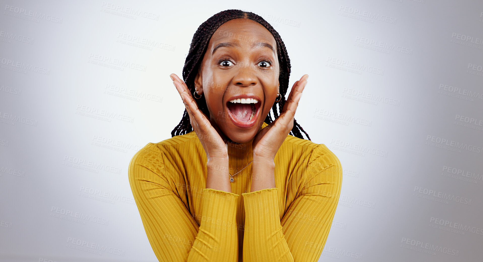 Buy stock photo Wow, news and hands on face of black woman in studio happy with competition, prize or bonus on grey background. Surprise, omg or portrait of African lady winner with mind blown emoji or lotto results