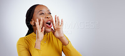 Buy stock photo News, announcement and happy black woman shouting in studio for coming soon, deal or info on grey background. Screaming, excited and female model with emoji for giveaway, sale or sign up motivation