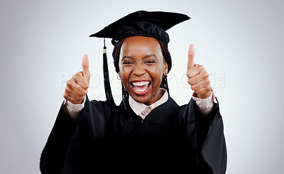 Buy stock photo Graduation cap, woman and thumbs up for study success, celebration and education, learning or college in studio. Portrait of excited African graduate or student with like emoji on a white background