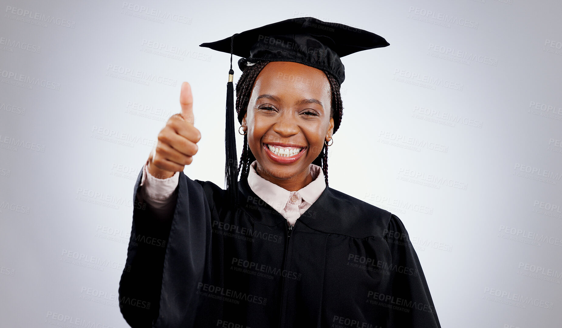 Buy stock photo Graduation cap, thumbs up and woman or student success with celebration, education and learning or college achievement in studio. Portrait of an african graduate with like emoji on a white background