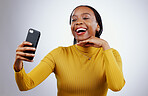 Studio, happy or black woman taking selfie on social media with confidence, post or smile online. African lady, memory or face of influencer taking a photograph, vlog or picture on grey background