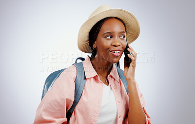 Phone call, travel and black woman with a smile, surprise and conversation on a grey studio background. African person, tourism and model with a smartphone, listening and communication with contact