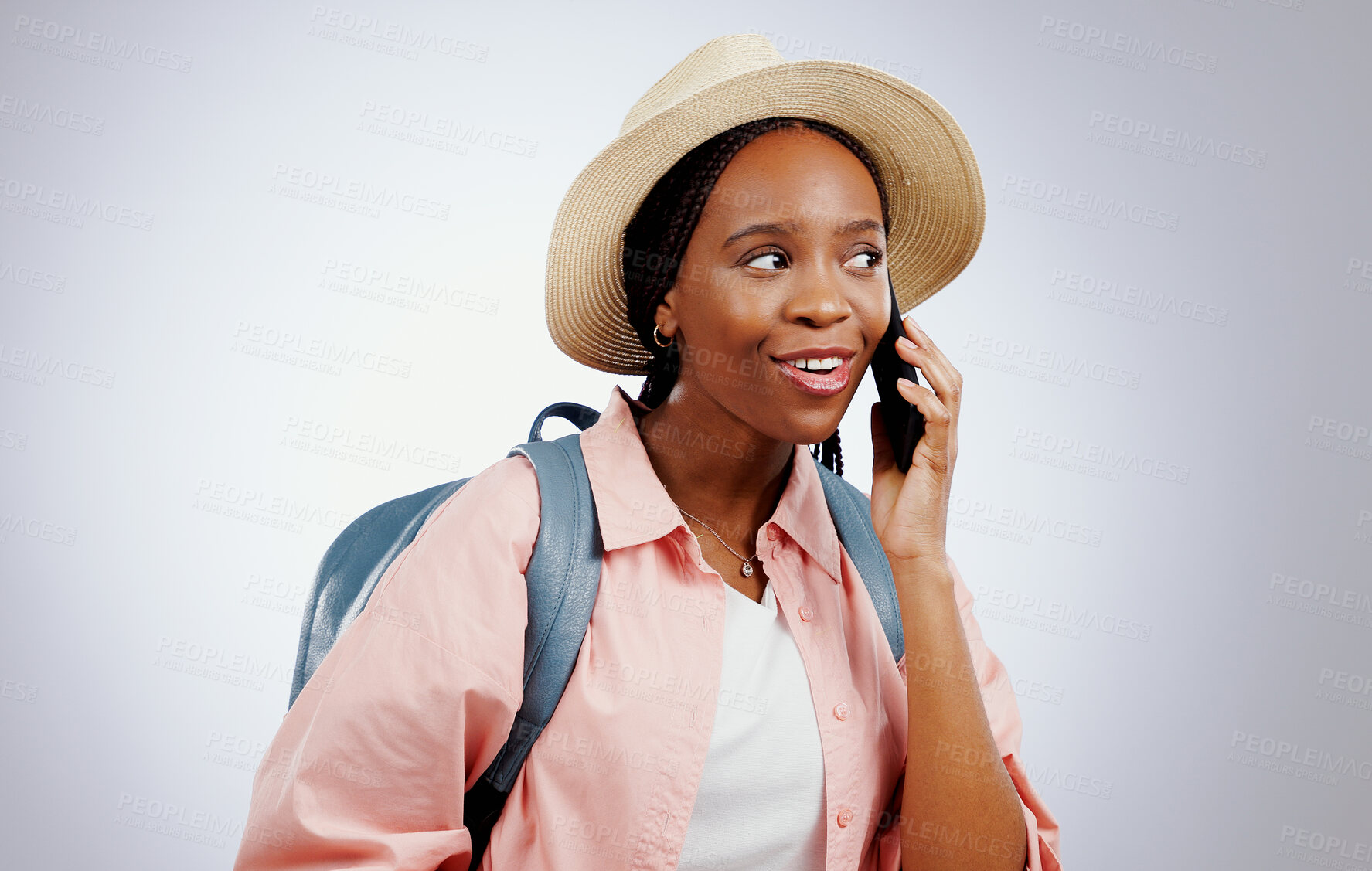 Buy stock photo Phone call, travel and black woman with a smile, surprise and conversation on a grey studio background. African person, tourism and model with a smartphone, listening and communication with contact