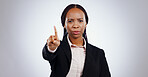 Stop, finger and portrait of business woman in studio with warning, no or limit on grey background. Protest, palm and face of lawyer with emoji vote, threat or control order, security or not allowed
