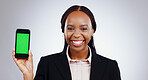 Happy woman, phone and green screen for website design, social media marketing or information in studio. Business portrait of african employee with mobile app and online space on a white background
