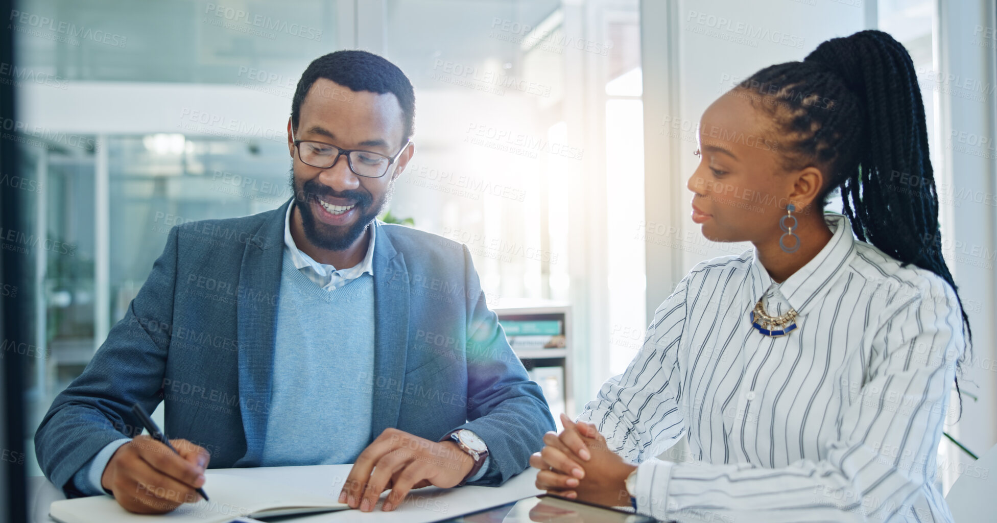 Buy stock photo Black people, business and meeting with paperwork in office for planning ideas, project collaboration and consulting for feedback. Man, woman and team in conversation for brainstorming with documents