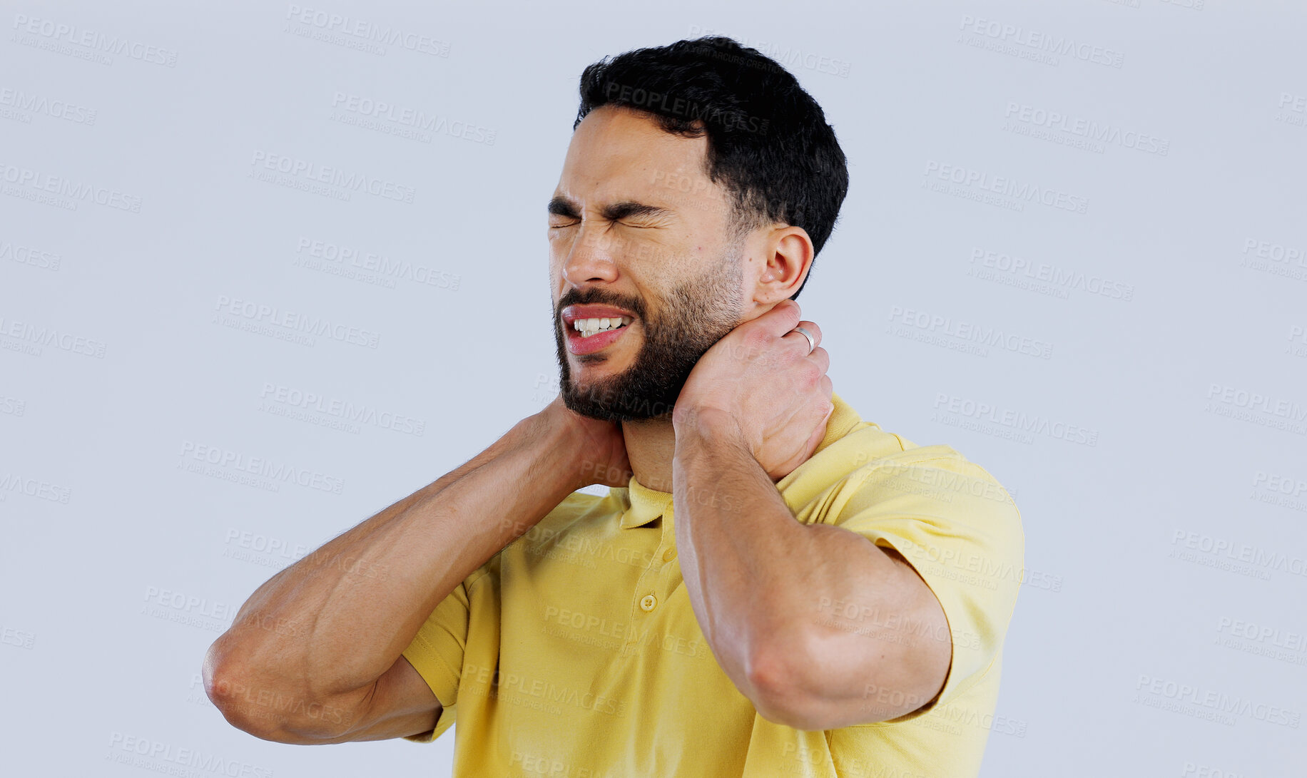 Buy stock photo Neck pain, stress and man in studio with tired joints, arthritis risk and burnout on white background. Sick indian model, injury and massage muscle for first aid, emergency or frustrated with fatigue