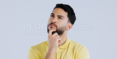 Buy stock photo Man, confused and thinking in studio of ideas, choice and dont know why on white background. Indian model daydream of decision, remember memory or planning solution, questions and brainstorming emoji