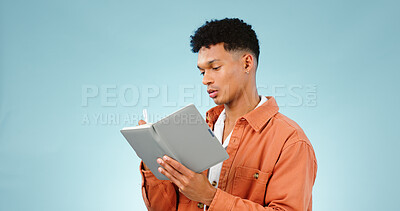 Buy stock photo Thinking, notebook and writing with man, planning and ideas with creativity on a blue studio background. Person, guy and model with problem solving, vision or education with student and knowledge