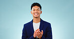 Man, portrait and clapping hands or celebration studio or business growth, winning or opportunity. Male person, face and applause on blue background as mockup or achievement, congratulations or pride