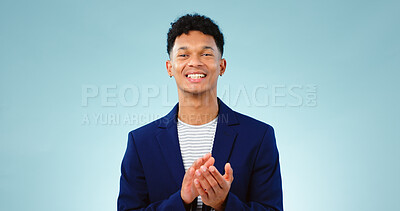 Buy stock photo Man, portrait and clapping hands or celebration studio or business growth, winning or opportunity. Male person, face and applause on blue background as mockup or achievement, congratulations or pride
