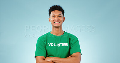 Buy stock photo Happy man, volunteer and smile with portrait in studio for eco friendly mock up on blue background in Cape Town. Young person, model and excited for choice, prevention and climate change for future