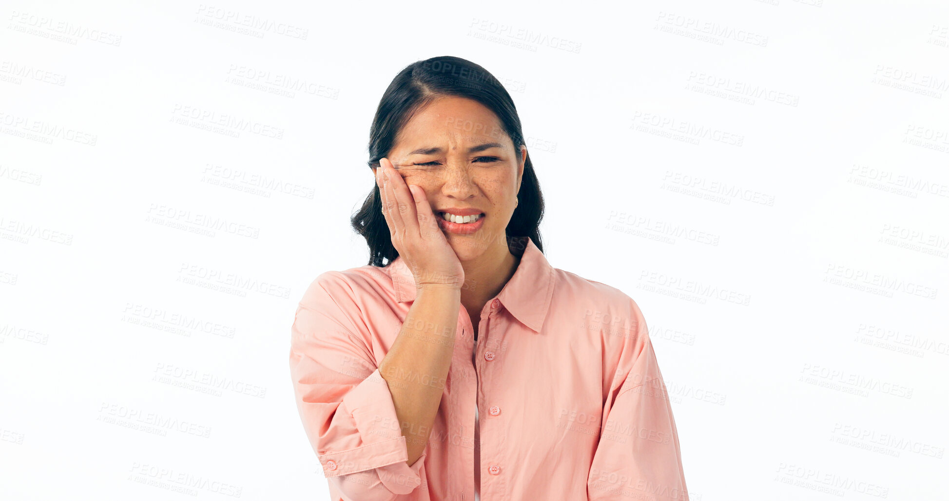 Buy stock photo Frustrated woman, tooth ache and pain for dental help, gum disease or sore against a white studio background. Female person mouth injury, teeth or oral inflammation and irritation on mockup space