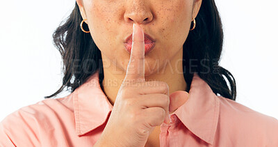 Buy stock photo Finger on lips, zoom and woman with secret in studio with quiet, announcement or news on white background. Gossip, closeup and face of female model with emoji for whisper, confidential or privacy