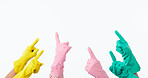 Cleaner gloves, hands and closeup with point to mockup space, studio and promotion by white background. Rubber ppe, safety and color with finger for feedback, review and choice for cleaning services