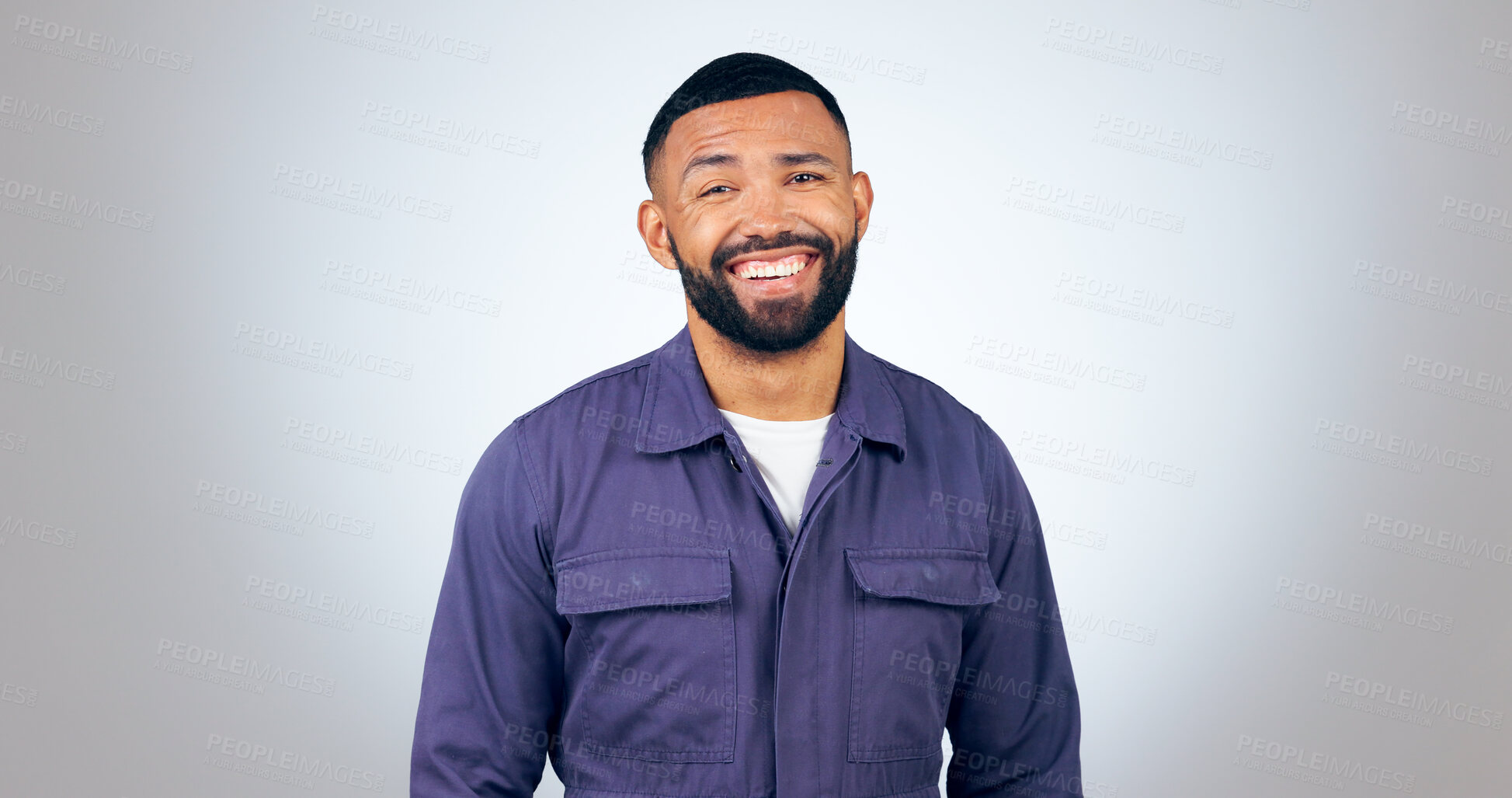 Buy stock photo Portrait, laugh and happy business man in studio with humor, joke or funny personality on grey background. comic, face and isolated entrepreneur with confidence, positive attitude or feel good mood