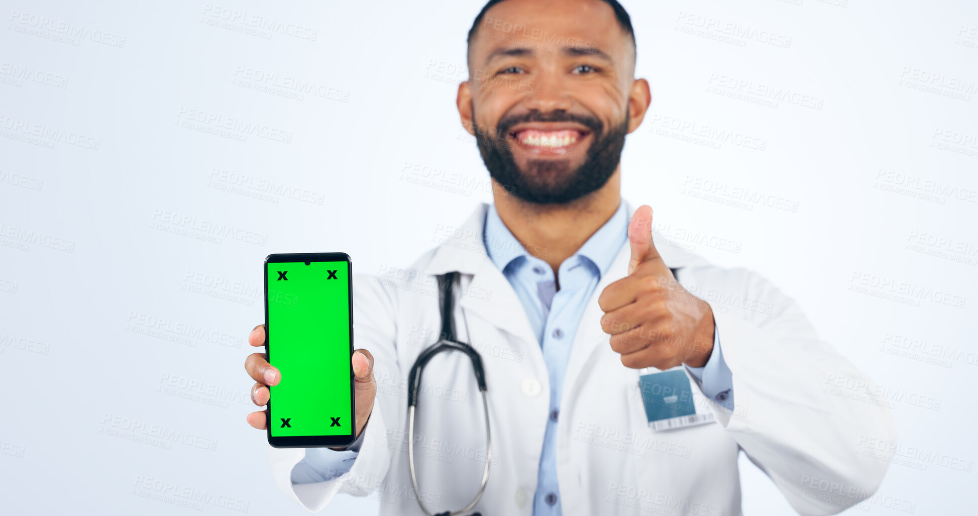 Buy stock photo Phone, green screen and portrait of doctor with thumbs up, agreement or registration in white background. Studio, healthcare or sign for like, yes and ok mobile app for telehealth services or success