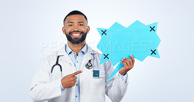 Buy stock photo Doctor, speech bubble and communication mockup, chat poster or healthcare translation, forum and voice in studio. Portrait of african man pointing to medical quote or questions on a white background