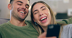 Laugh, phone and couple on sofa for meme on social media, internet and reading funny website together. Dating, happy and man and woman on smartphone and bonding, relax and love in living room at home