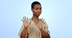 Black woman, fear and shock with hands for stop in studio on blue background for mock up. Portrait, female model and horror emoji for bad, reaction or expression on face for alarm, confused or scared