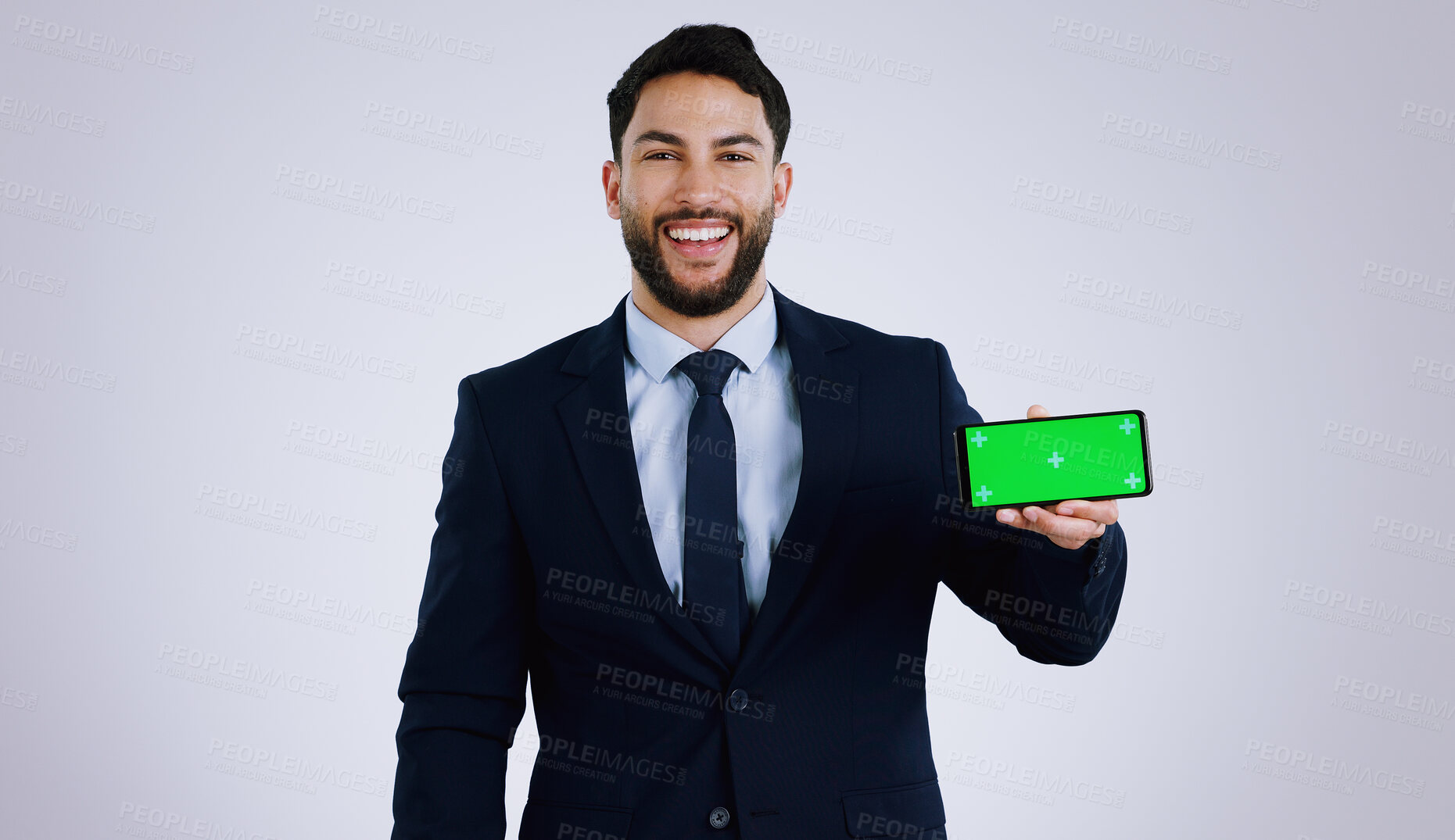 Buy stock photo Professional man, mobile green screen and space for social media, software or online subscription in studio. Portrait of business worker on phone, website mockup or contact info on a white background