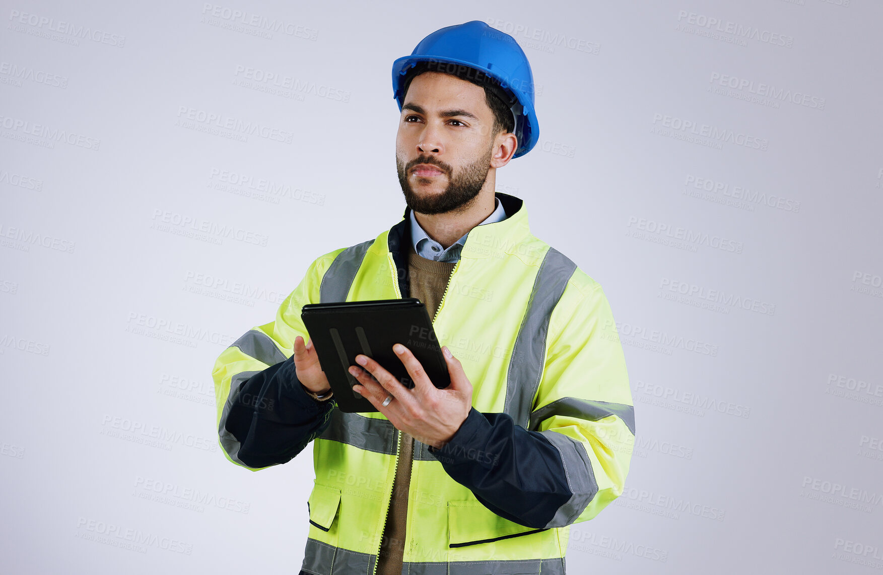 Buy stock photo Engineering, man and tablet for inspection, thinking of renovation or project management on a white background. Construction worker for architecture survey, planning and digital technology in studio