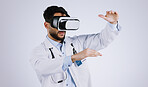 Man, doctor and virtual reality glasses for healthcare software, metaverse and futuristic user experience in studio. Medical worker watch in 3d vision, hands and VR technology on a white background