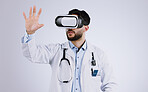 Doctor, VR vision and glasses for medical software, metaverse, futuristic technology and digital experience in studio. Healthcare man with 3d screen, hands and virtual reality on a white background