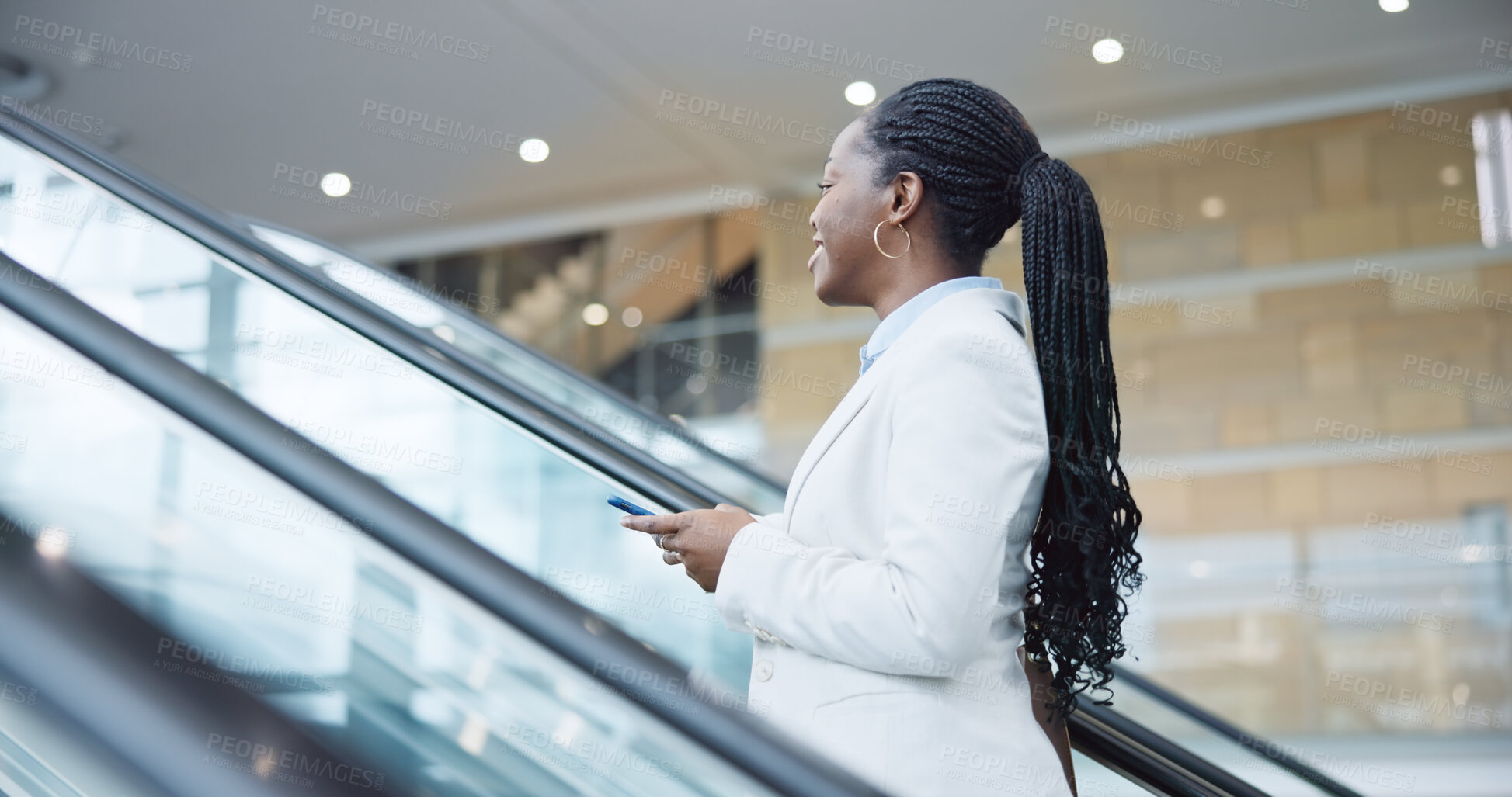 Buy stock photo Business, escalator and travel with black woman, smartphone and social media with accountant. African person, employee and broker with a cellphone, airport and happy with connection and digital app