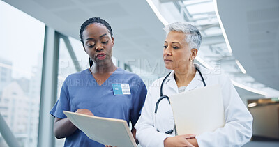 Buy stock photo Doctor, healthcare report and nurse with discussion for collaboration, hospital and assessment by medical results. Women, specialist and young medic with patient information, diversity and teamwork