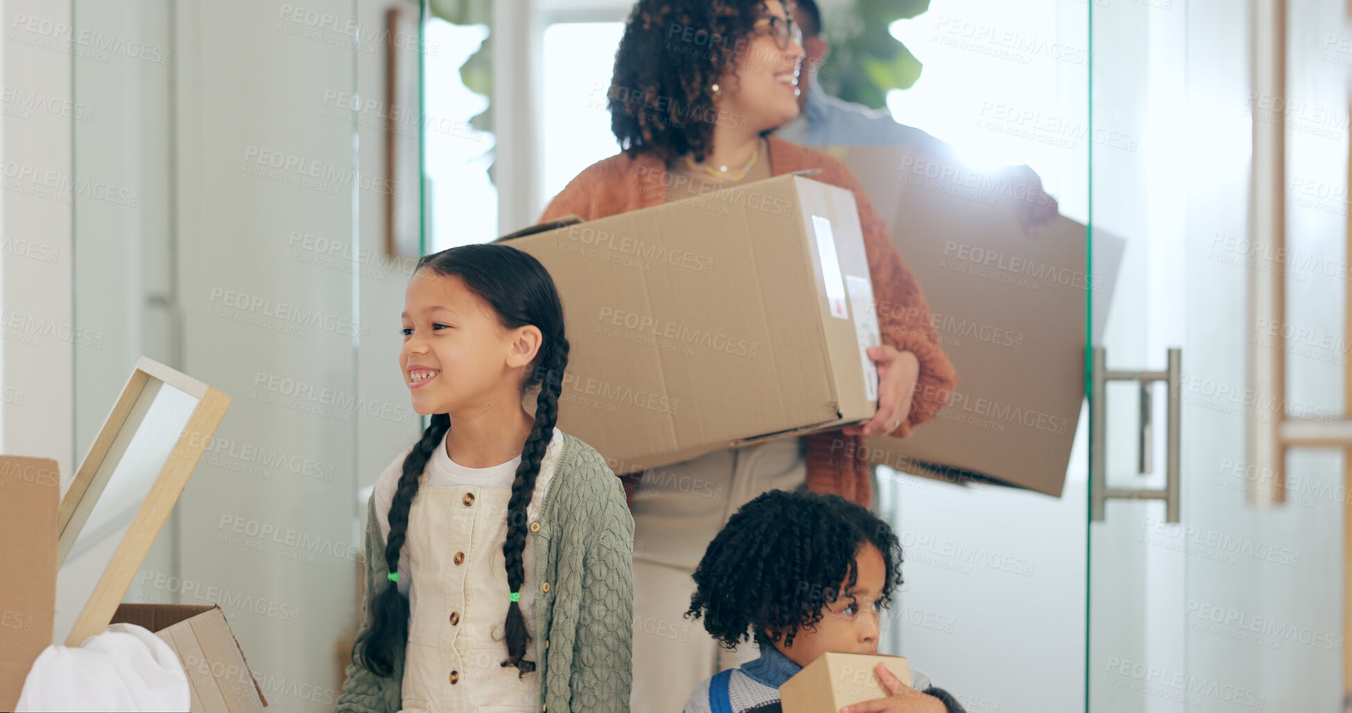 Buy stock photo Parents, children and boxes, moving and new home with property mortgage, future opportunity and security. Mother, father and happy kids together in apartment, real estate investment and cardboard box