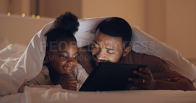 Buy stock photo Father, daughter and tablet at night with internet for movie, cartoon or streaming with blanket on bed in bedroom. Family, man and girl child with technology in the dark for film, video and bonding