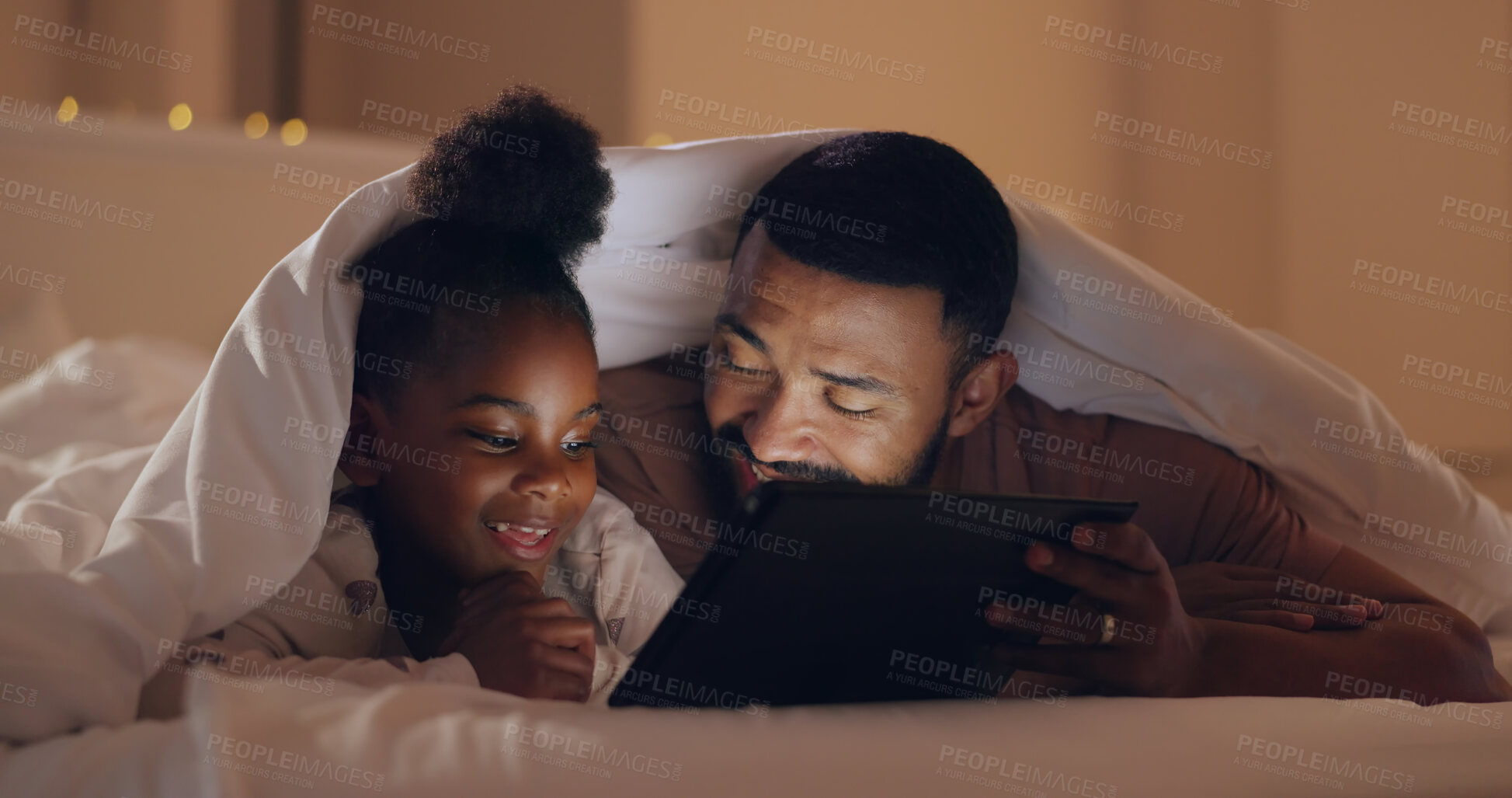 Buy stock photo Father, daughter and tablet at night with internet for movie, cartoon or streaming with blanket on bed in bedroom. Family, man and girl child with technology in the dark for film, video and bonding